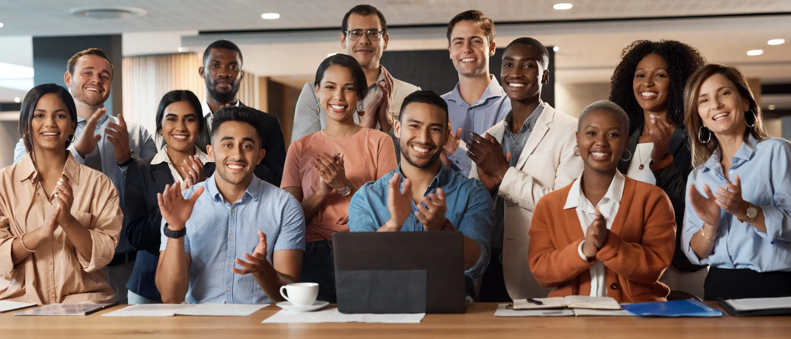 shot-of-a-group-of-young-businesspeople-clapping