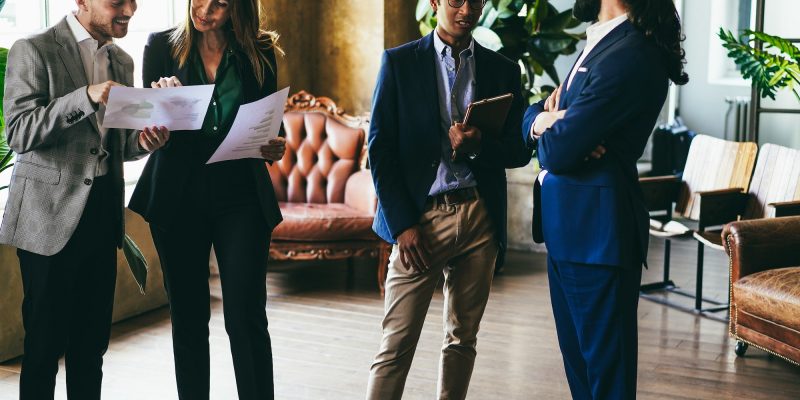Multiracial business people working inside office - Focus on indian man face